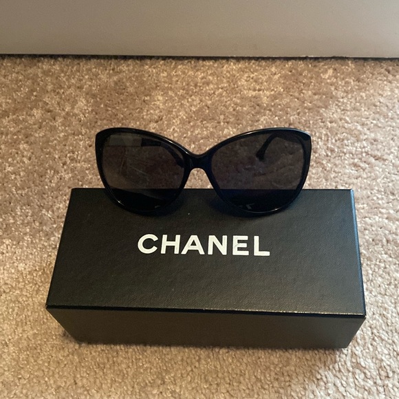 CHANEL Accessories - Black Chanel Sunglasses with ivory and black two toned stems .